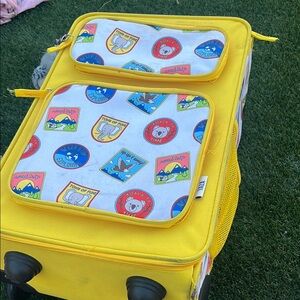 Yellow Taza Rolling Suitcase with Fun Patches